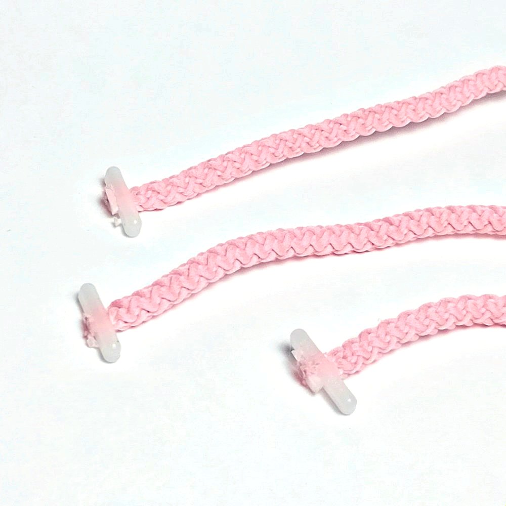 Embout en T surmoulé sur cordon rose